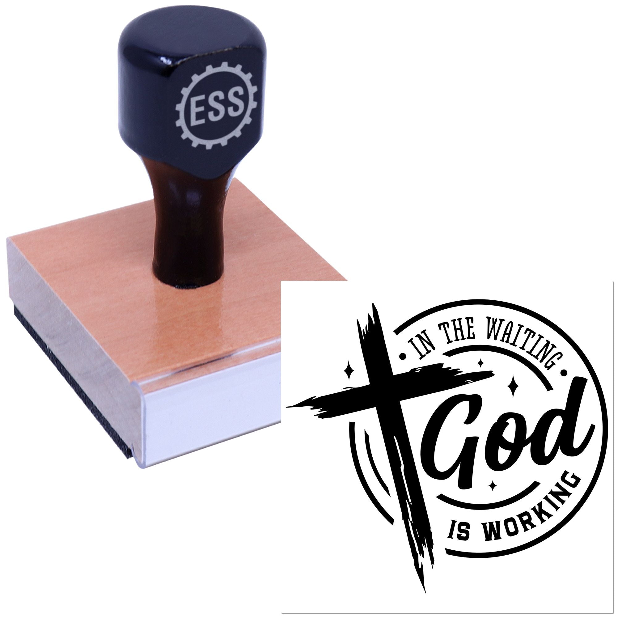 Dark blue ESS stamp on a pink wood base beside a black circular seal reading In the Waiting God Is Working.