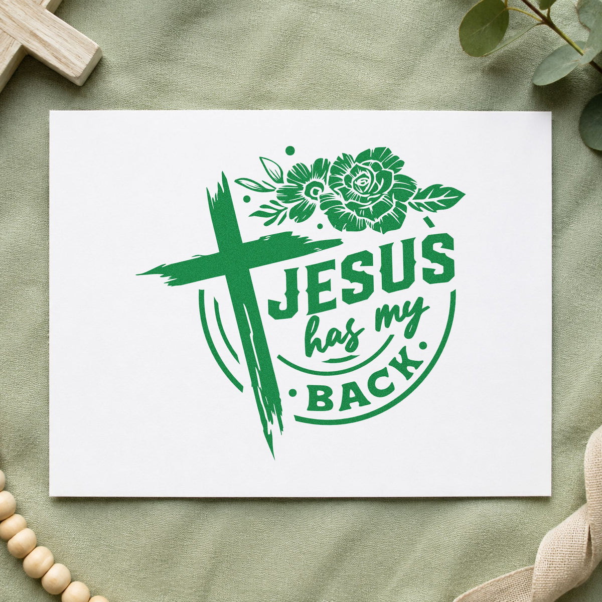 Jesus Has My Back Rose Badge craft stamp imprint in green ink on a handmade project, one idea being framed mudroom art.