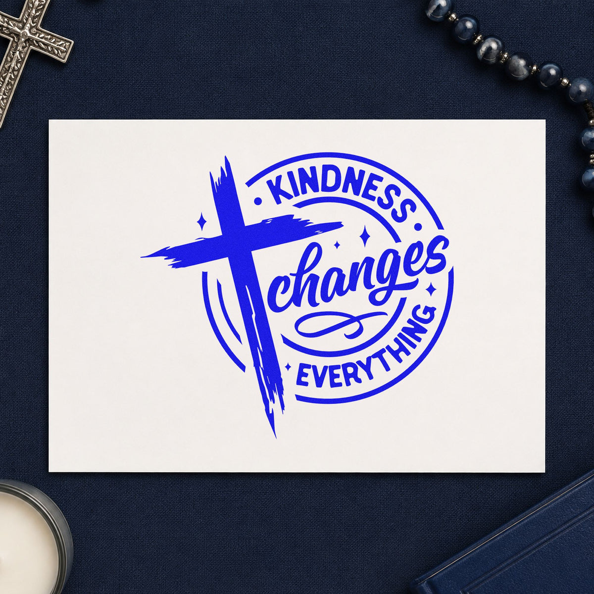 Kindness Changes Everything craft stamp imprinted in blue ink on paper, a design suited to pay it forward cards.