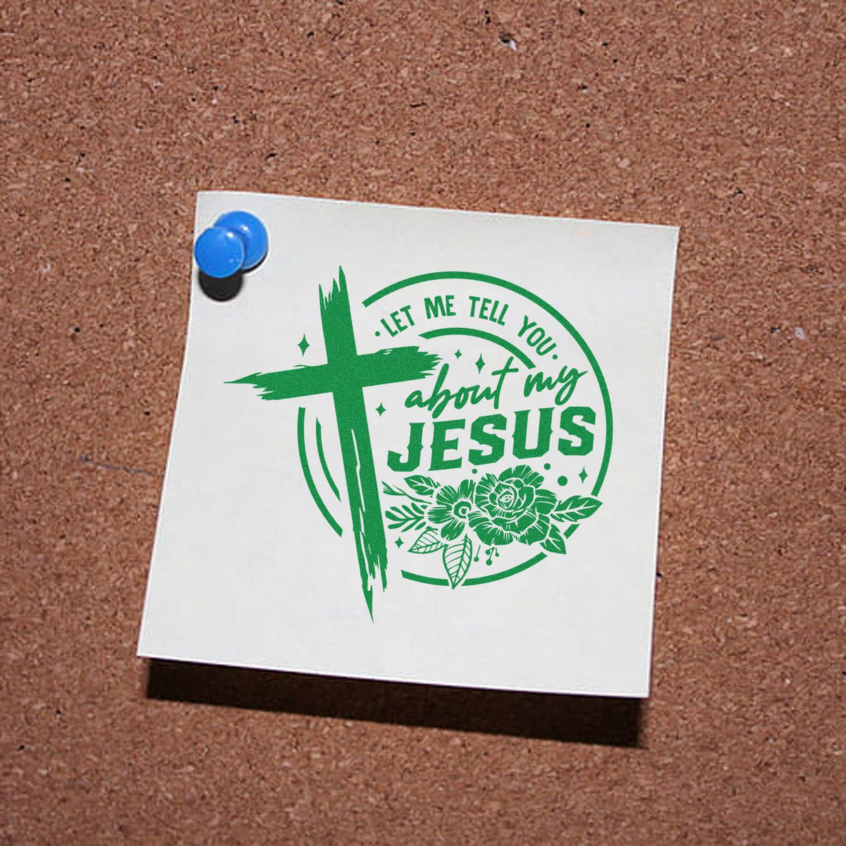 Green Christian stamp seal design with cross, flowers, and Let me tell you about my Jesus on white paper pinned to corkboard.