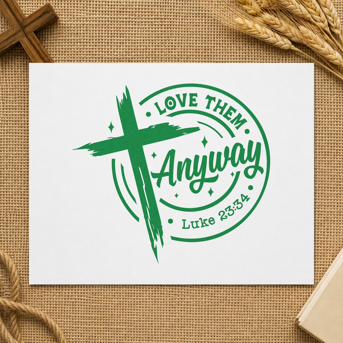 Love Them Anyway craft stamp imprint in green ink on a handmade project, one idea being family photo pages.