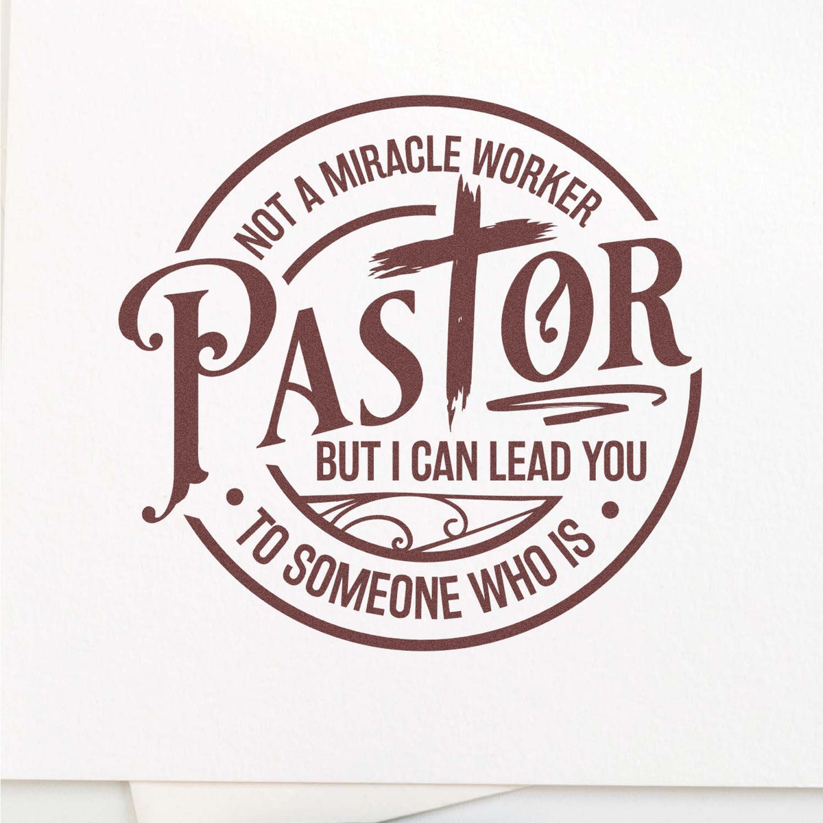 Brown circular pastor stamp seal on white paper with cross and slogan: Not a miracle worker, but I can lead you to someone who is.