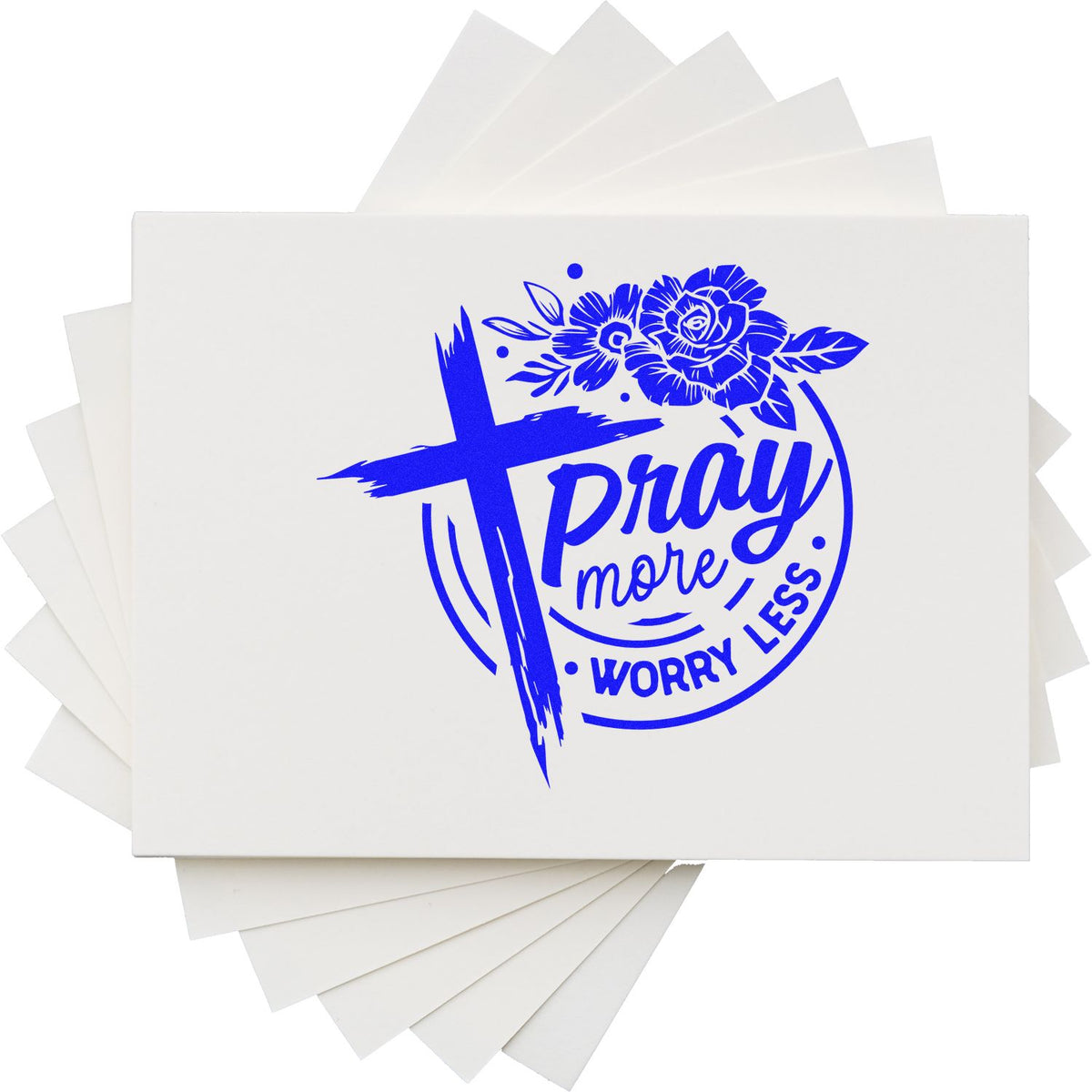 White stamp and seal product with blue cross, floral design, and Pray more, worry less text on stacked white cards.