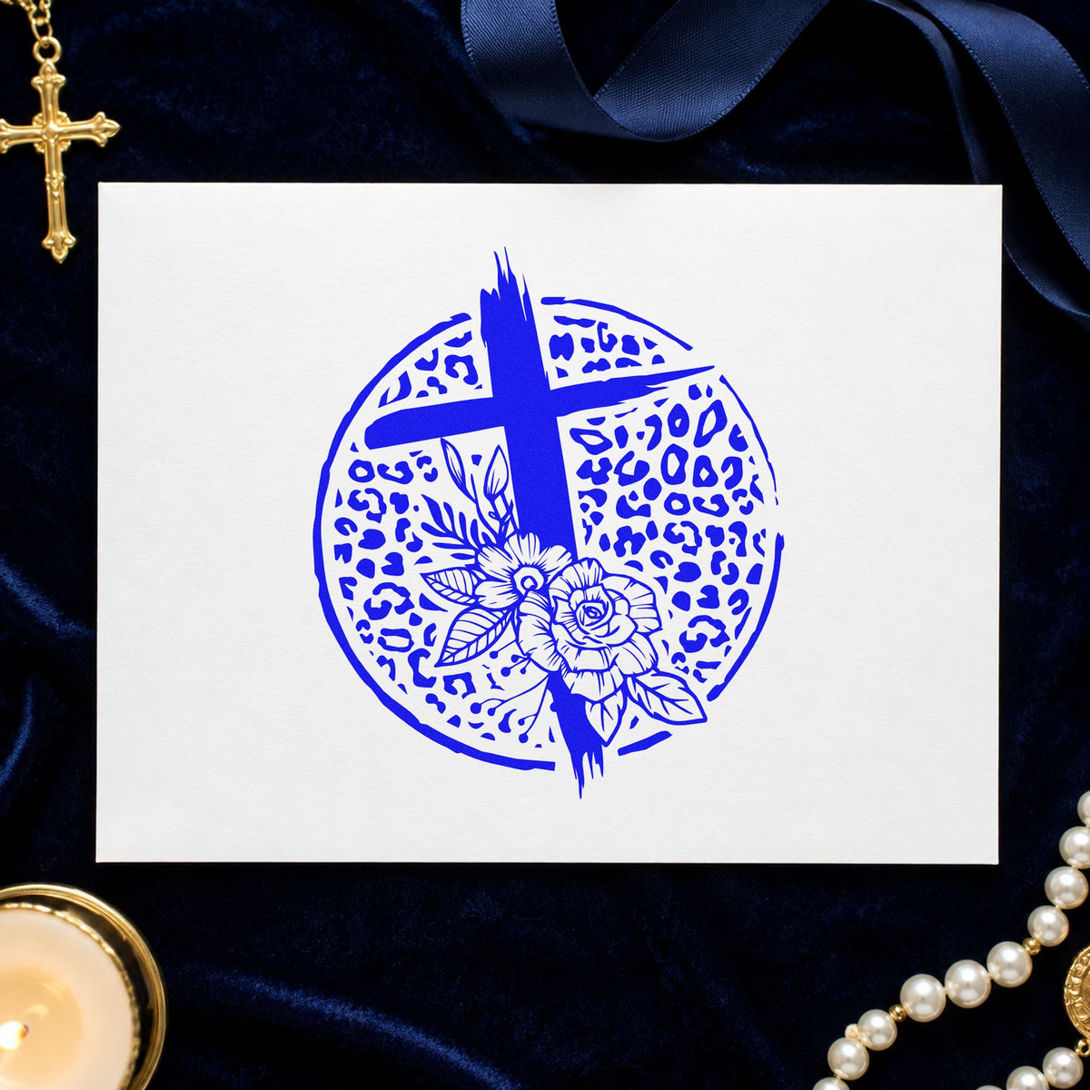 Leopard Floral Cross craft stamp imprinted in blue ink on paper, a design suited to soap bar wraps.