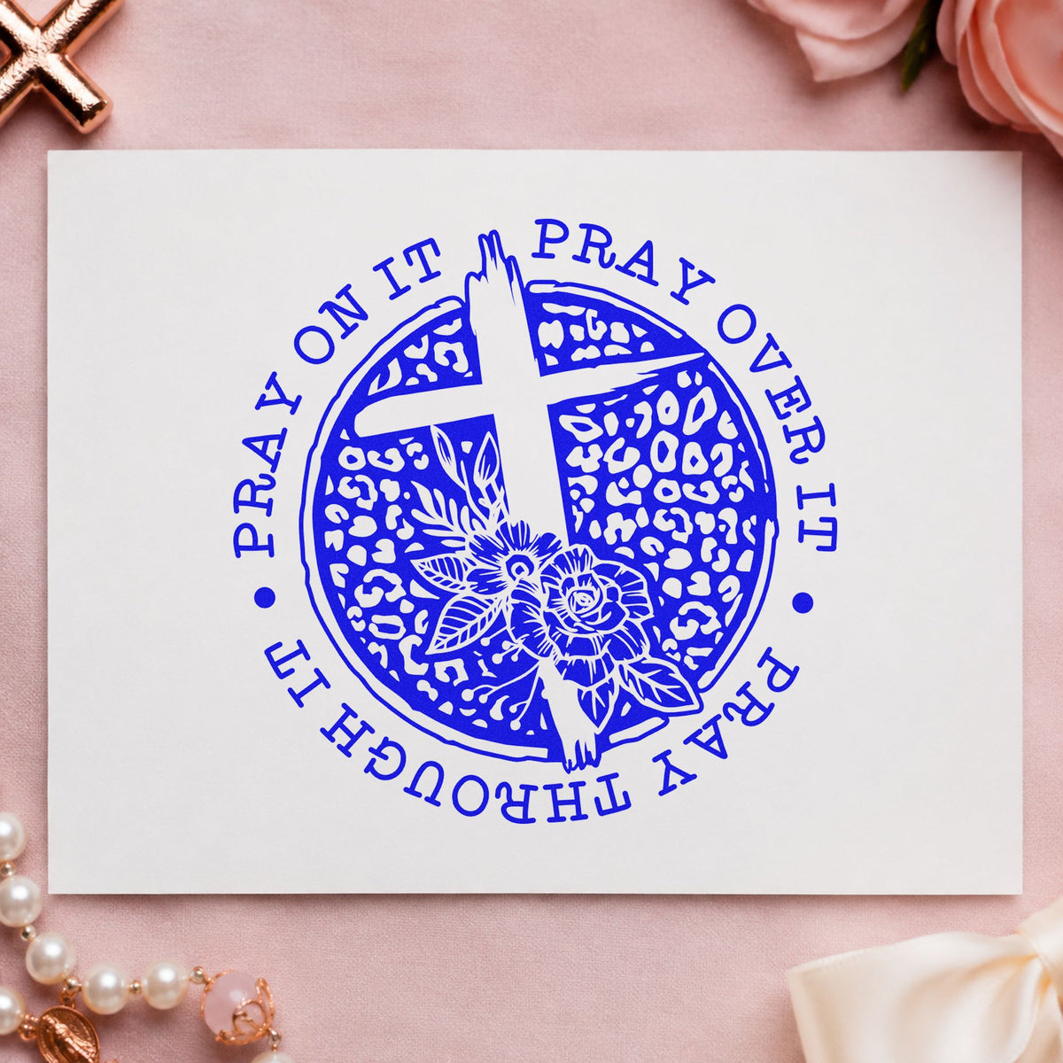 Pray Dark Floral Circle craft stamp imprinted in blue ink on paper, a design suited to coffee roast labels.