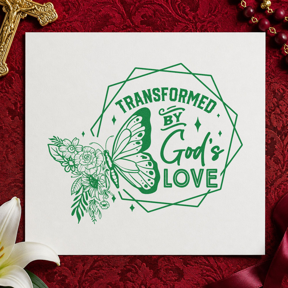 Transformed by God's Love craft stamp imprint in green ink on a handmade project, one idea being garden journal pages.