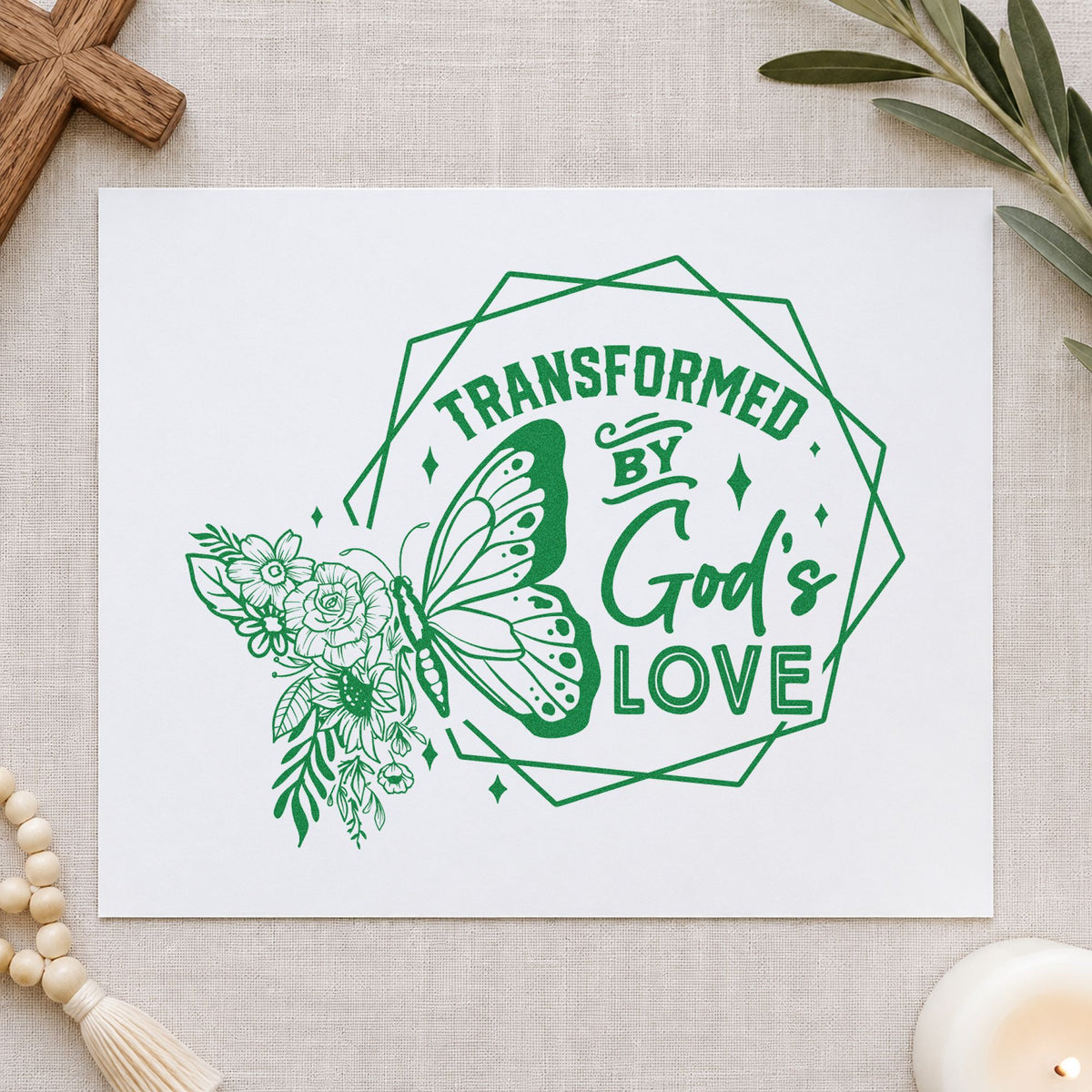 Transformed by God's Love craft stamp imprint in green ink on a handmade project, one idea being framed sunporch art.
