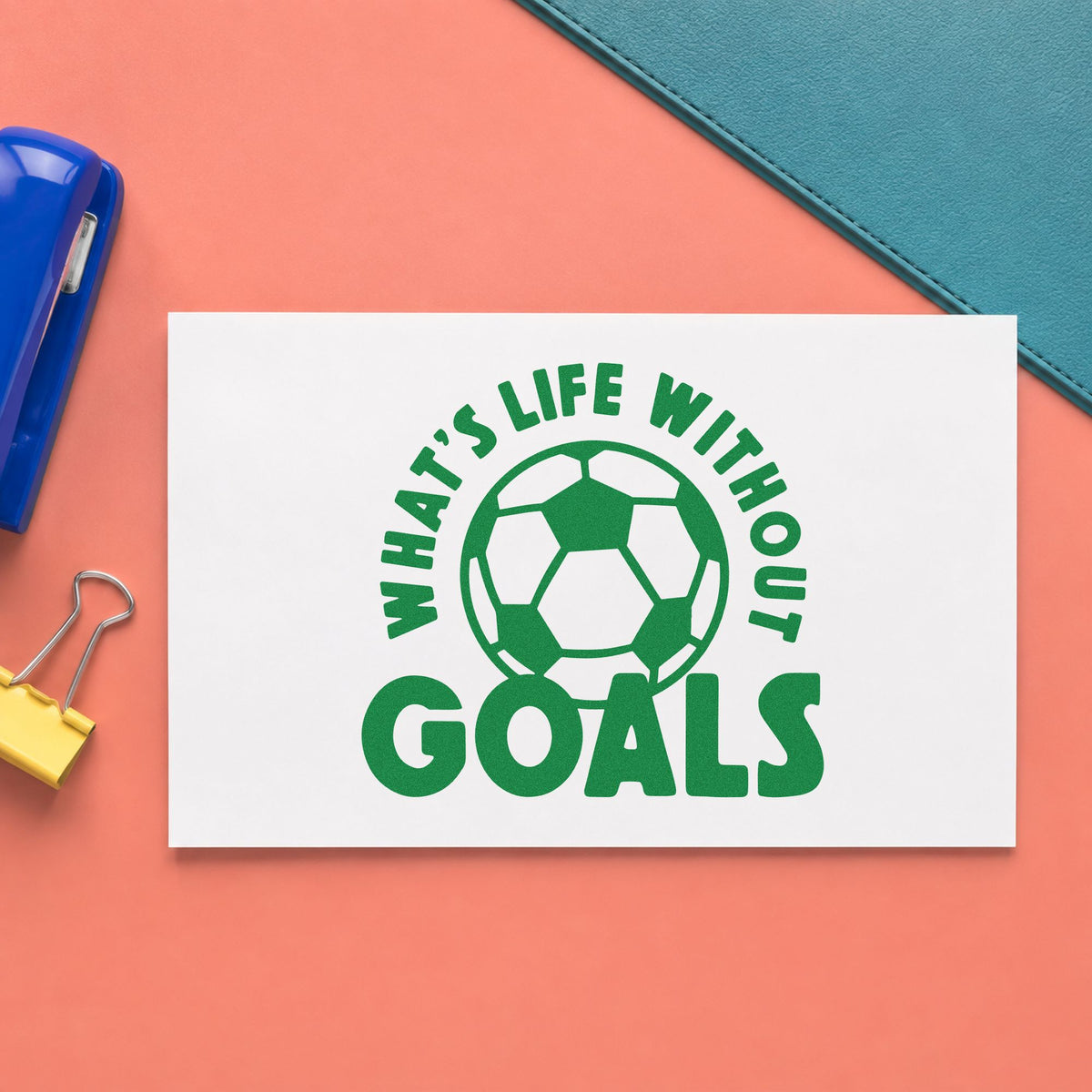 Life Without Goals Ball craft stamp imprint in green ink on a handmade project, one idea being season scrapbook pages.