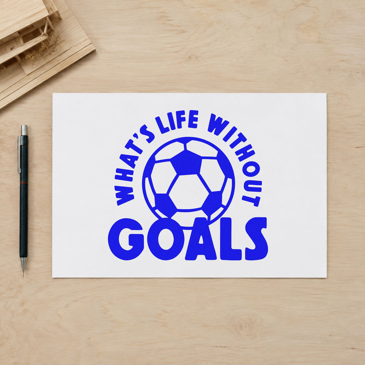 Life Without Goals Ball craft stamp imprinted in blue ink on paper, a design suited to fundraiser can labels.