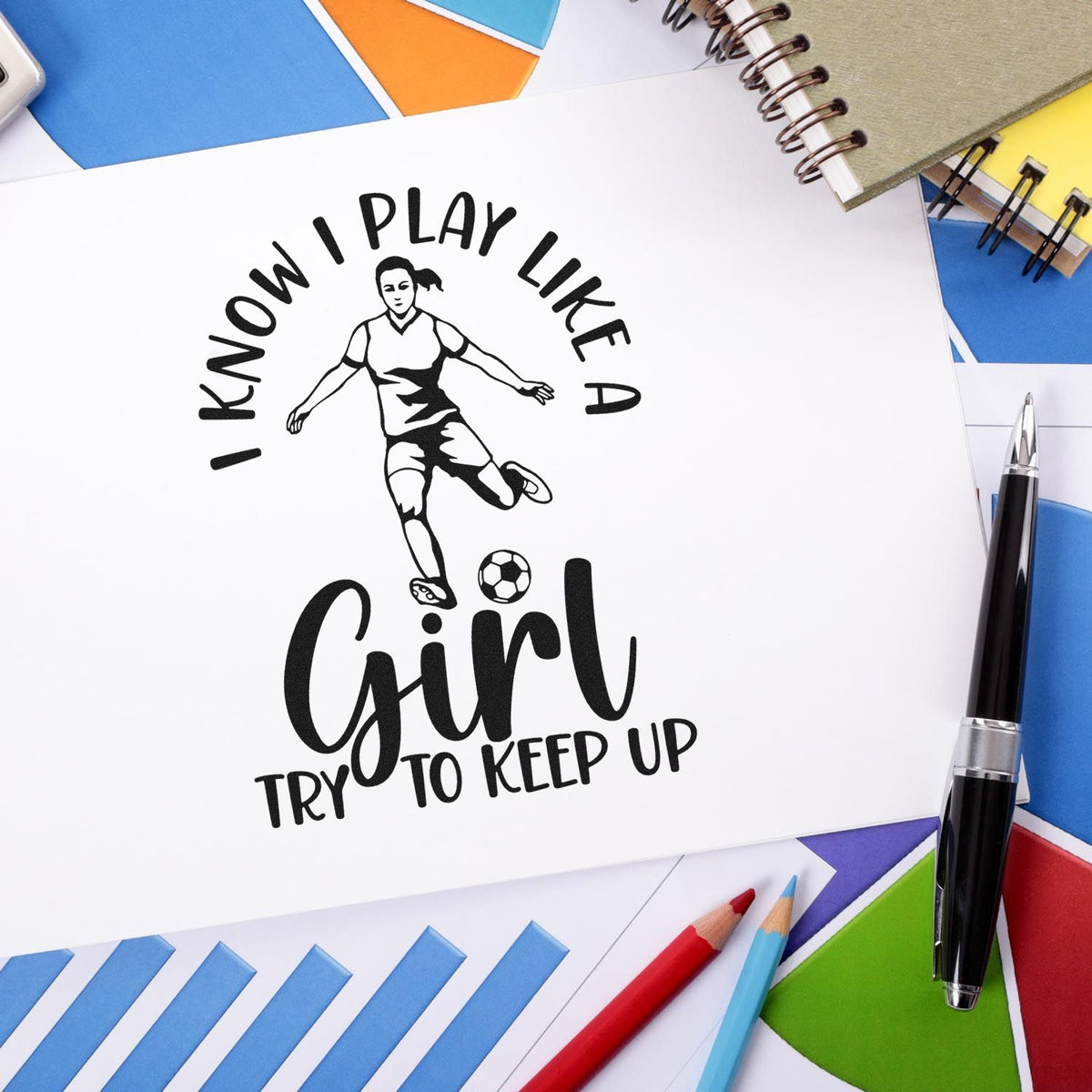 Black custom stamp with soccer girl and ball, reading I know I play like a girl, try to keep up, on white paper.