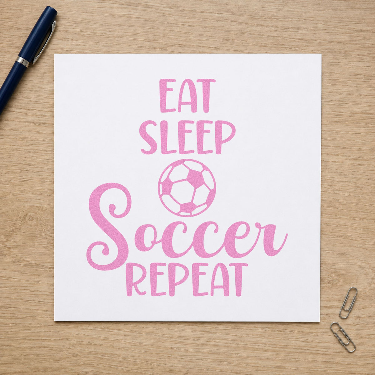Eat Sleep Soccer Repeat craft stamp in purple ink on cardstock, an easy option for meal prep tags.