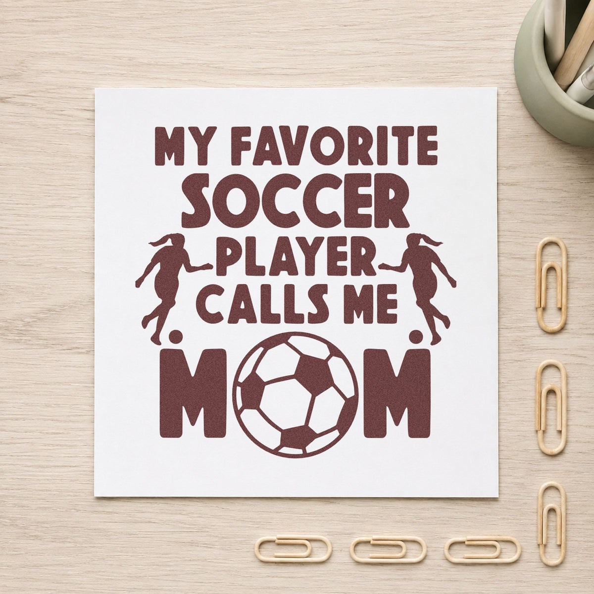 Favorite Soccer Player Mom rubber stamp printed in brown ink, ready for team photo mats and similar paper crafts.