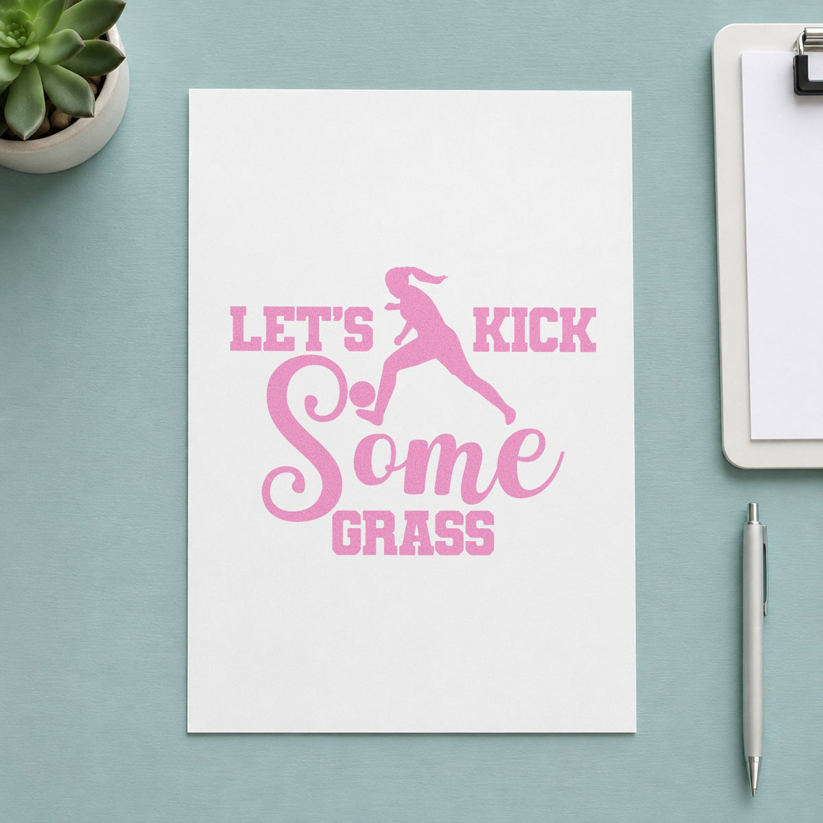 Let's Kick Some Grass craft stamp in purple ink on cardstock, an easy option for pregame snack tags.