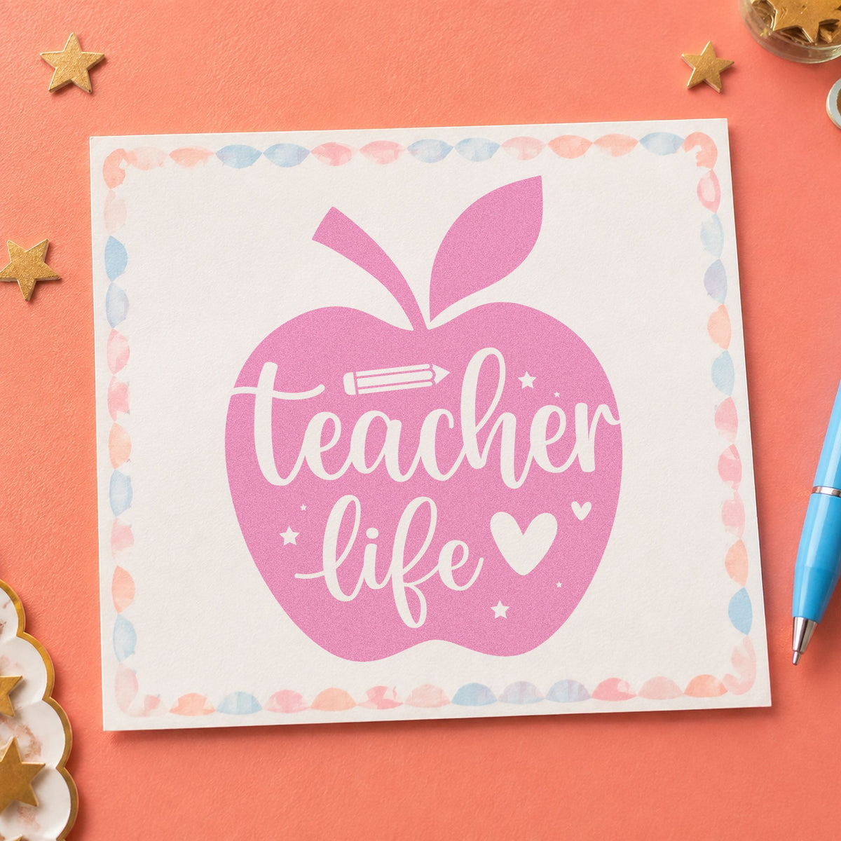 Teacher Life Apple craft stamp in purple ink on cardstock, an easy option for first day gift tags.