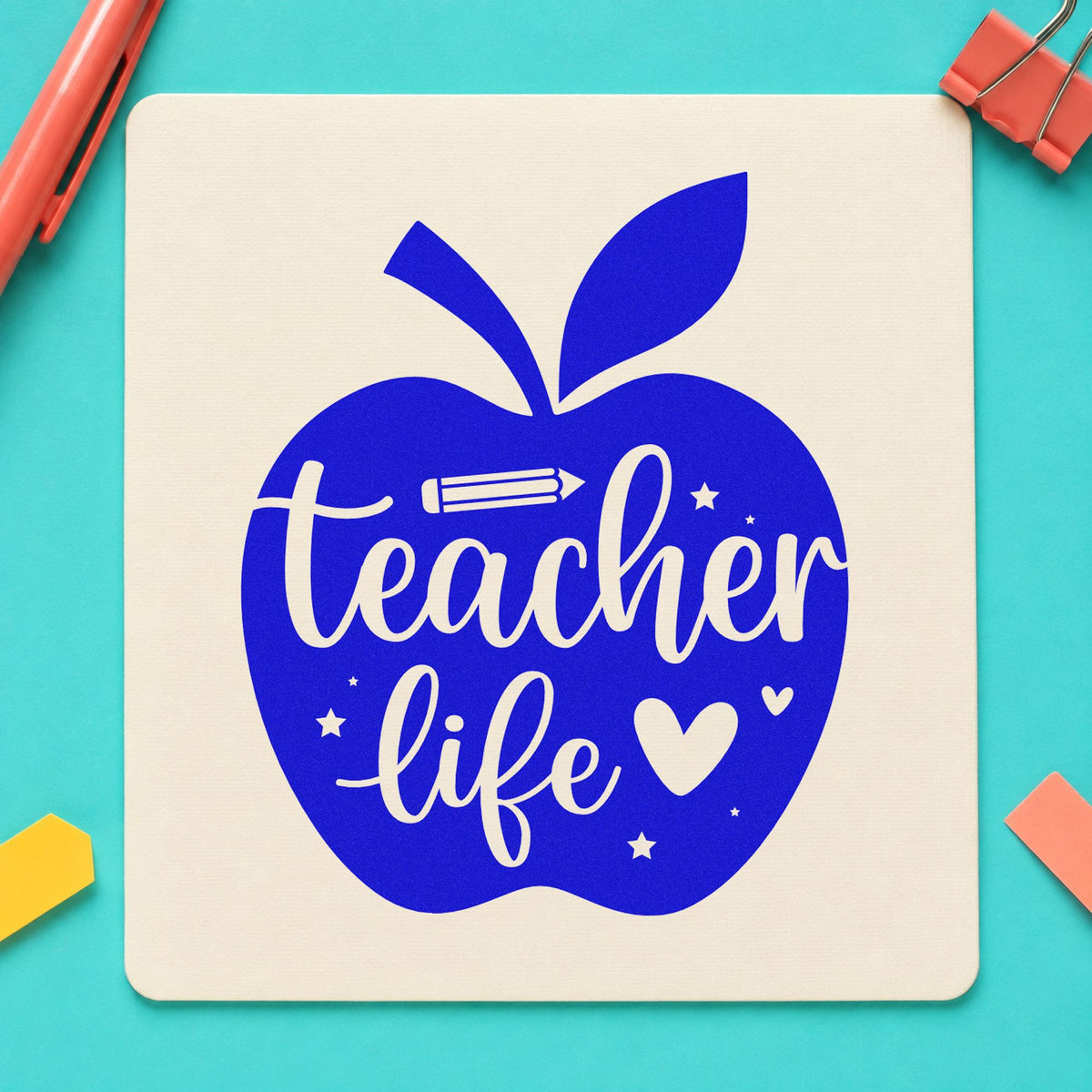 Teacher Life Apple craft stamp in blue ink on cardstock, an easy option for lanyard ribbon panels.