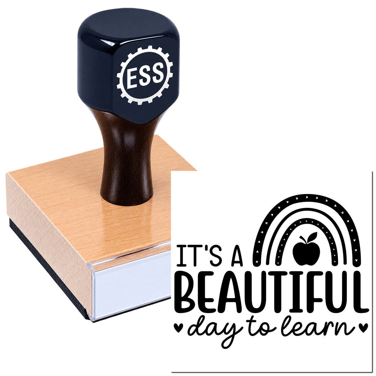 Dark navy stamp and seal on a pink block with black rainbow and apple classroom design.