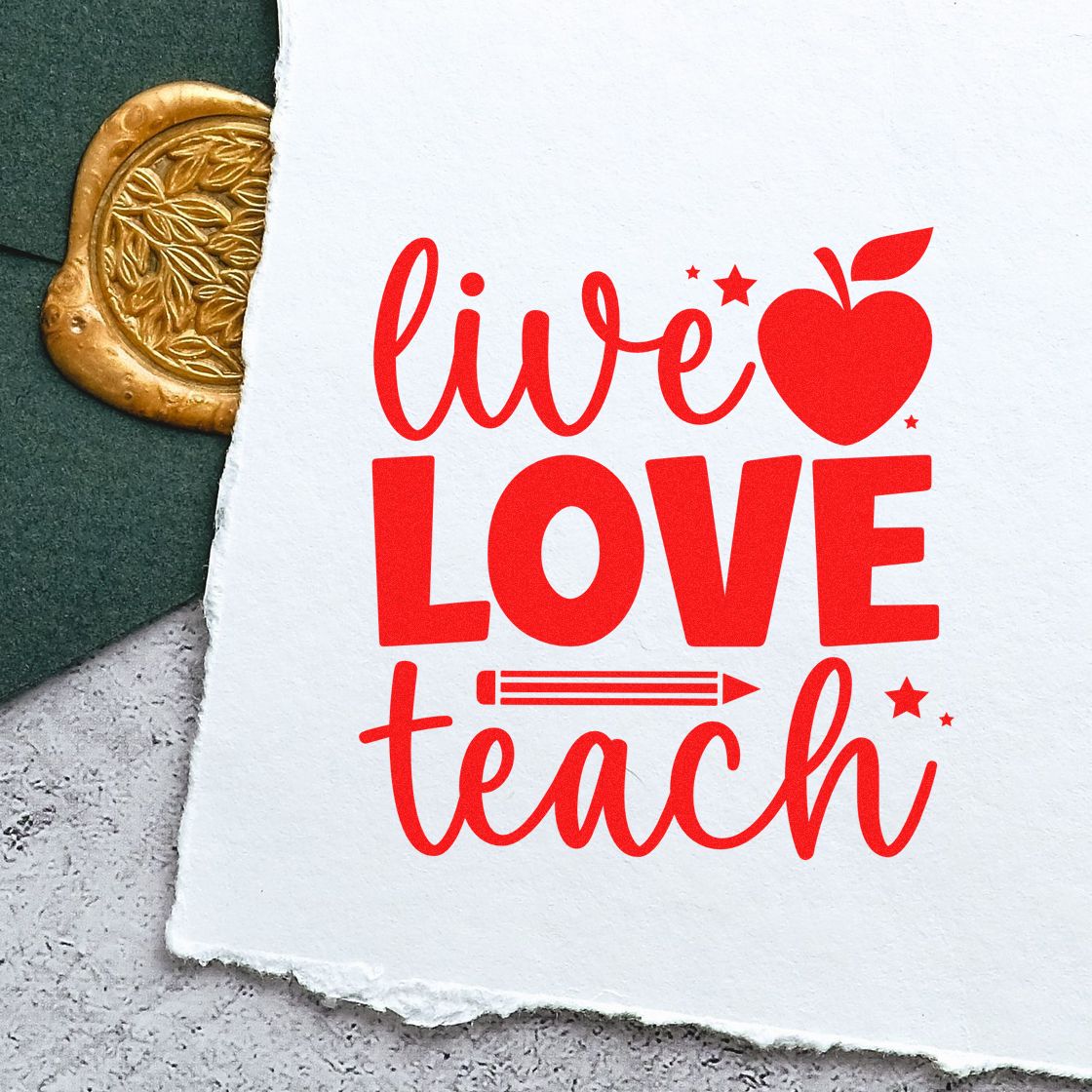 Red live LOVE teach stamp with apple heart icon on white paper, beside a gold embossed seal on dark green background.