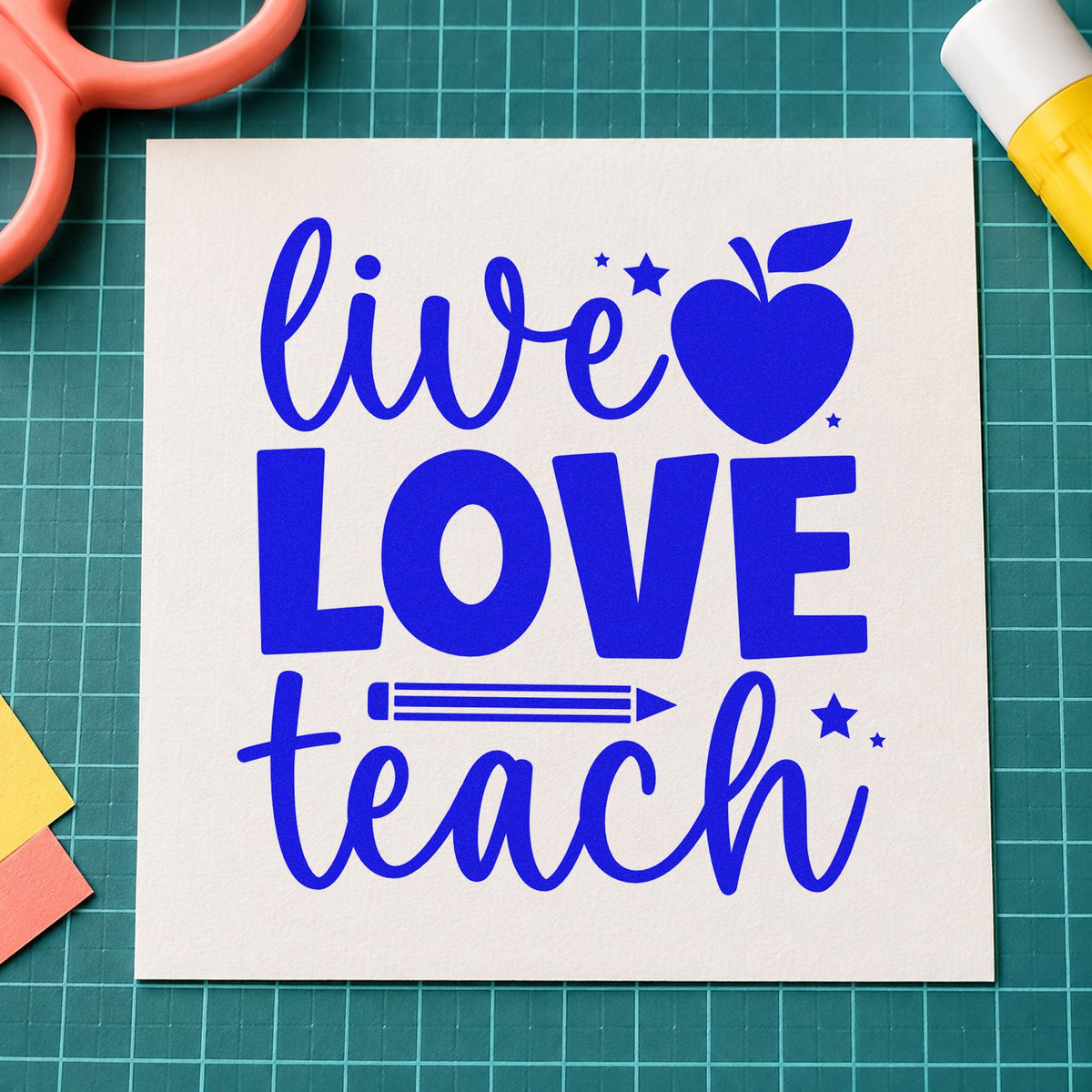 Live Love Teach craft stamp imprinted in blue ink on paper, a design suited to book bin labels.