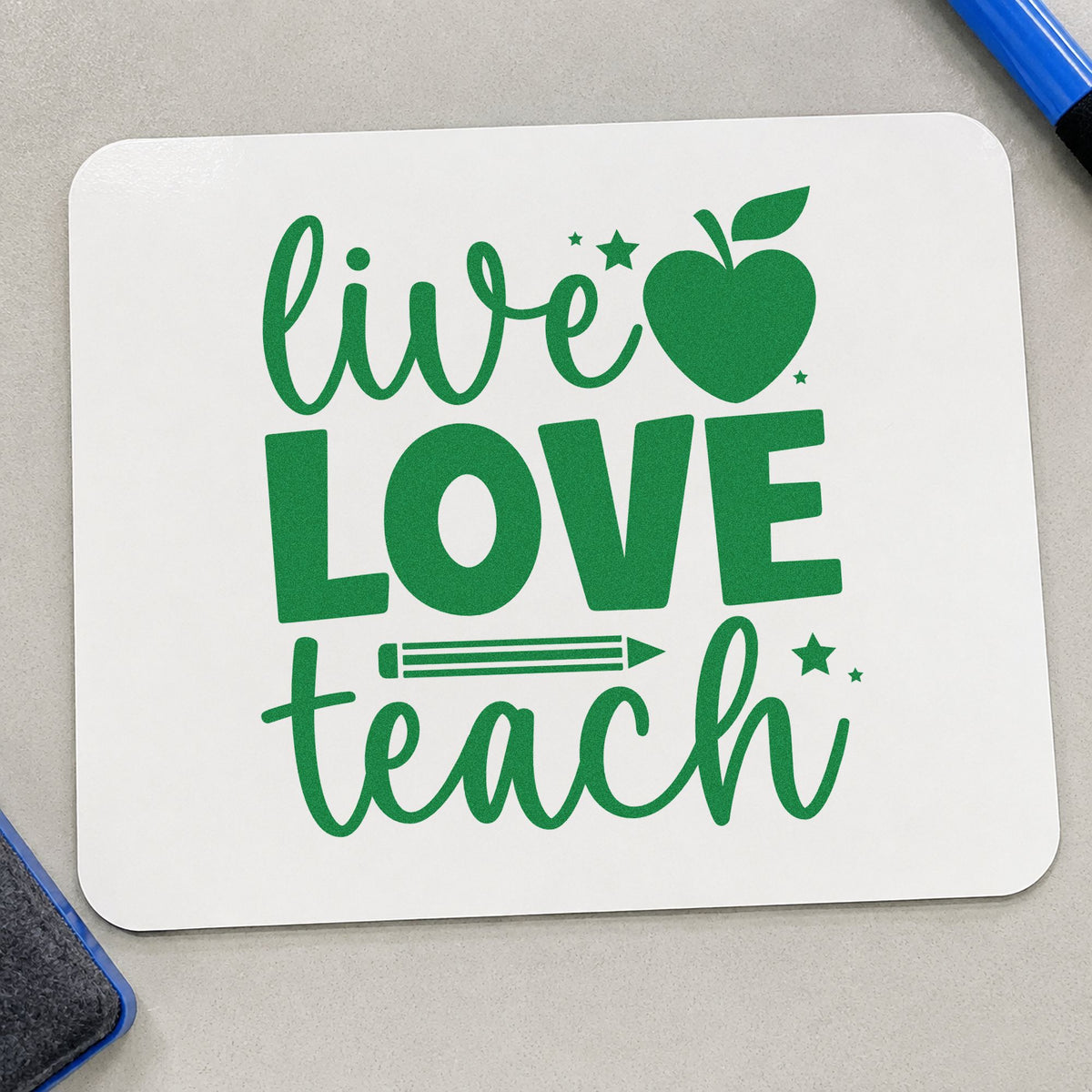 Live Love Teach craft stamp imprint in green ink on a handmade project, one idea being framed desk corner.