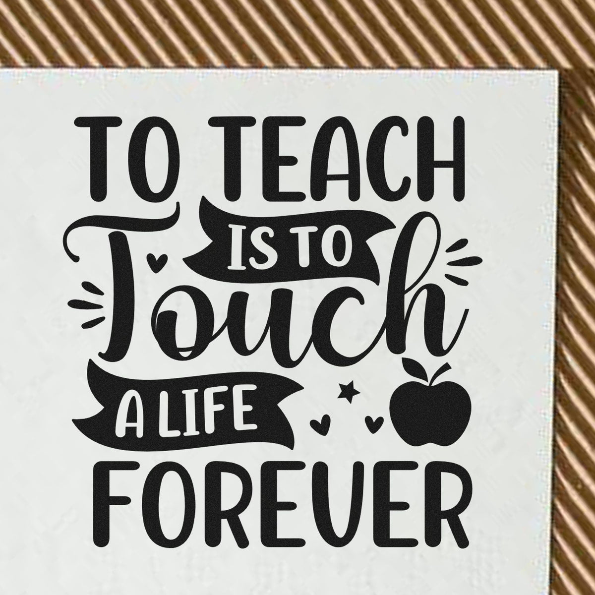 Black teaching stamp/seal design on white background with playful script, apple icon, hearts, stars, and To Teach Is to Touch a Life Forever.
