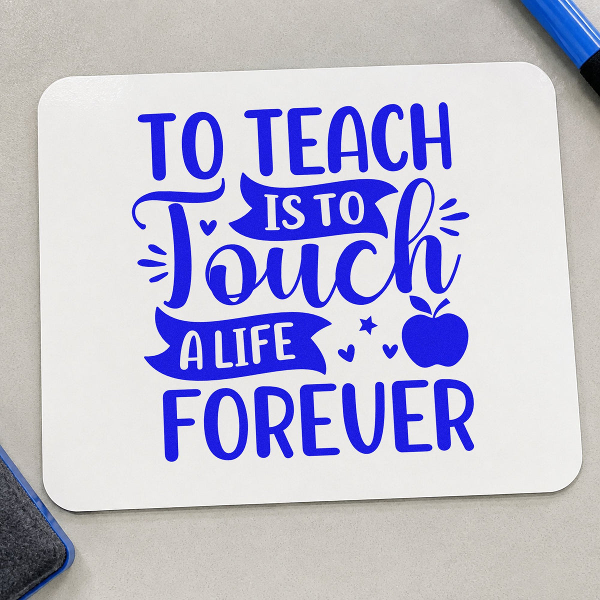 To Teach Is to Touch craft stamp in blue ink on cardstock, an easy option for quilt block panels.