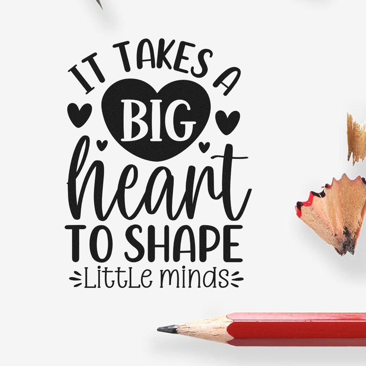 Black stamp/seal design with heart and script text: It takes a big heart to shape little minds, with red pencil accents.