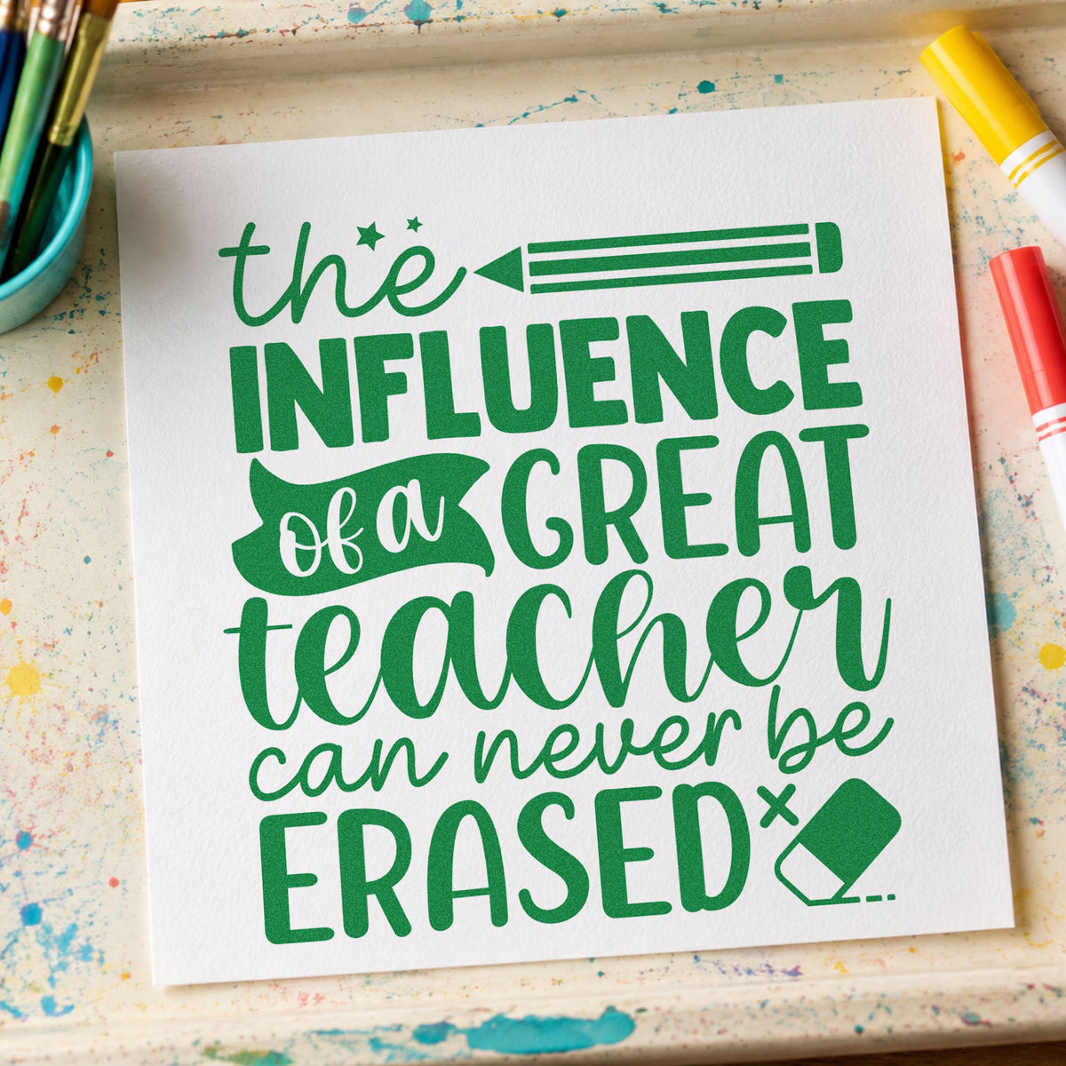 Great Teacher Influence craft stamp imprint in green ink on a handmade project, one idea being whiteboard note pages.