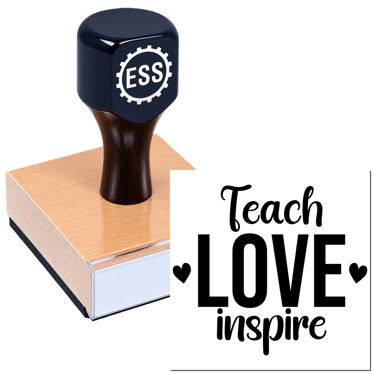 Navy ESS rubber stamp on wooden block with Teach Love Inspire seal design and heart accents