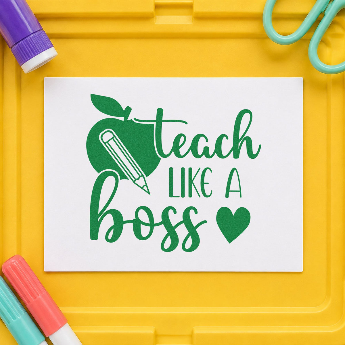 Teach Like a Boss craft stamp imprint in green ink on a handmade project, one idea being framed corner office.