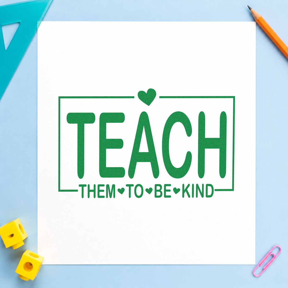 Teach Them to Be Kind craft stamp imprint in green ink on a handmade project, one idea being framed mudroom rule.