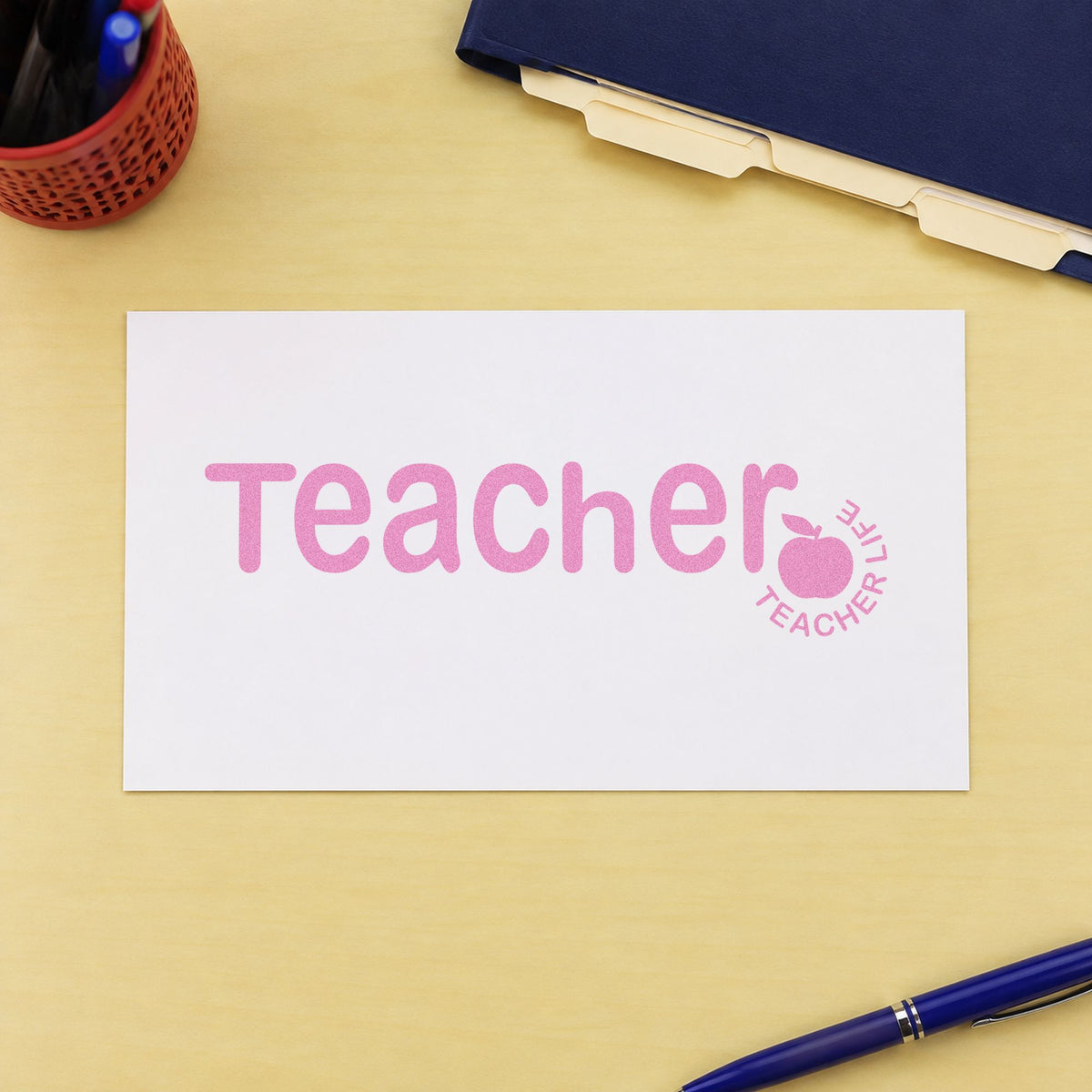 Teacher Life Apple craft stamp in purple ink on cardstock, an easy option for staff gift tags.