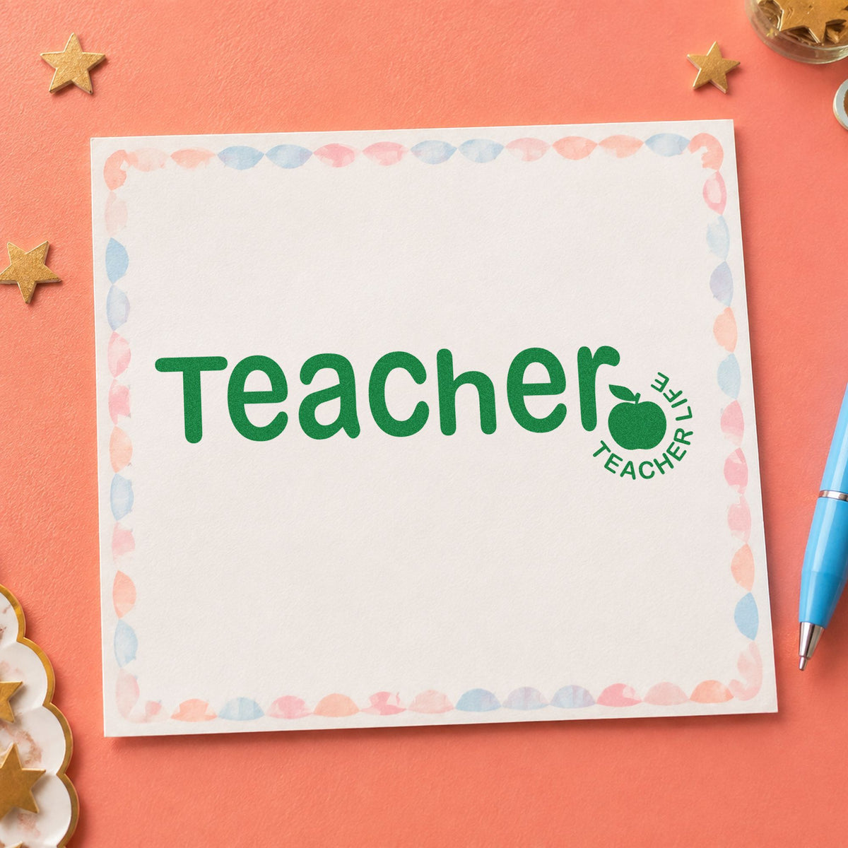 Teacher Life Apple craft stamp imprint in green ink on a handmade project, one idea being framed break wall.
