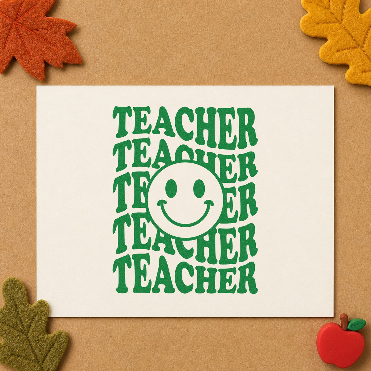 Teacher Smiley Stack craft stamp imprint in green ink on a handmade project, one idea being sign in sheet pages.