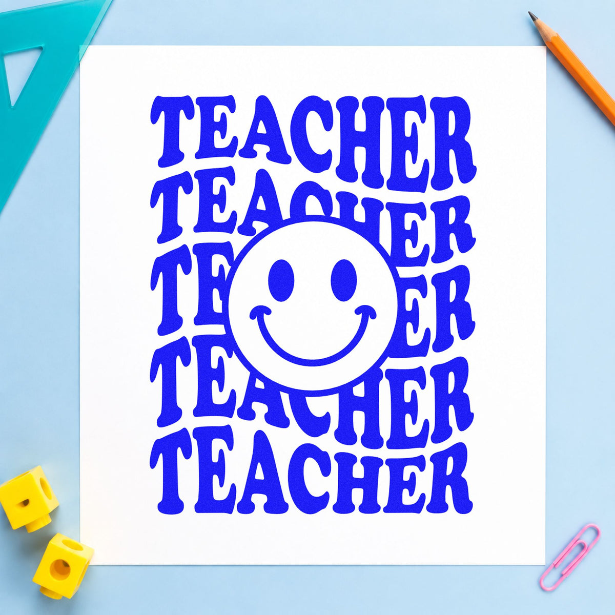 Teacher Smiley Stack craft stamp in blue ink on cardstock, an easy option for sweatshirt front panels.