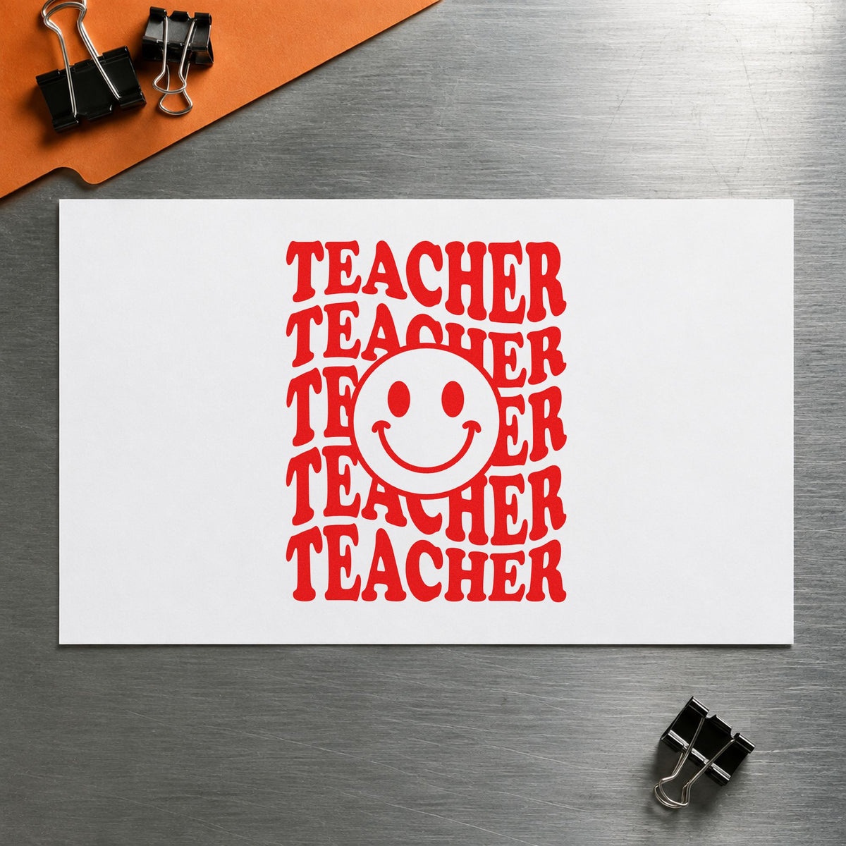 Teacher Smiley Stack rubber stamp shown in red ink, stamped for projects such as morale boost notes.