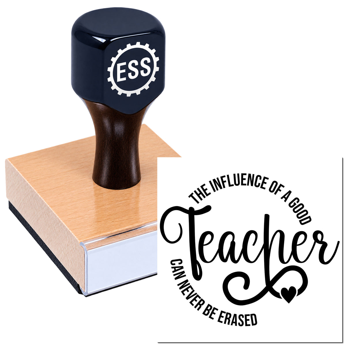 Black ESS rubber stamp on pink wooden block with teacher seal design, circular text, and heart icon.