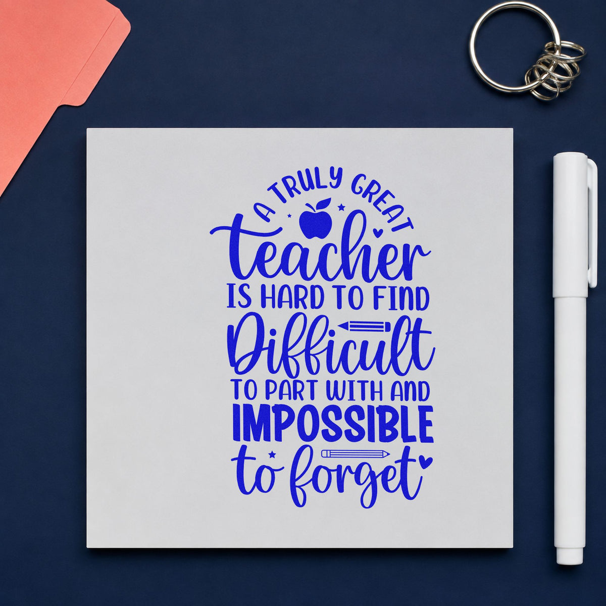 Truly Great Teacher craft stamp imprinted in blue ink on paper, a design suited to gift basket bands.