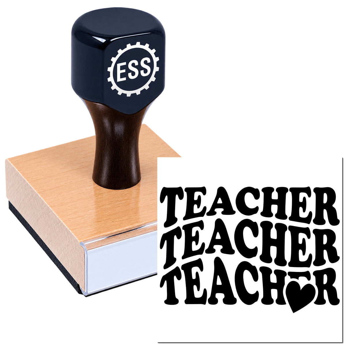 Dark blue ESS teacher stamp and seal on a wooden block with bold black TEACHER lettering.