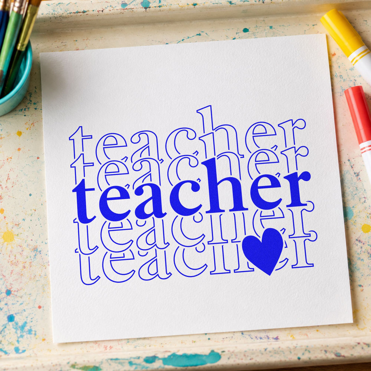 Teacher Serif Outline Stack craft stamp imprinted in blue ink on paper, a design suited to trophy base labels.