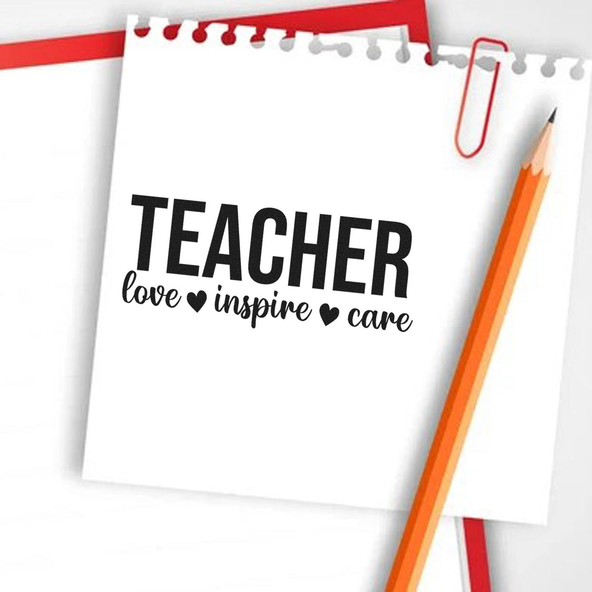 Teacher stamp and seal design on white notepad with bold black text, red paperclip, and orange pencil.