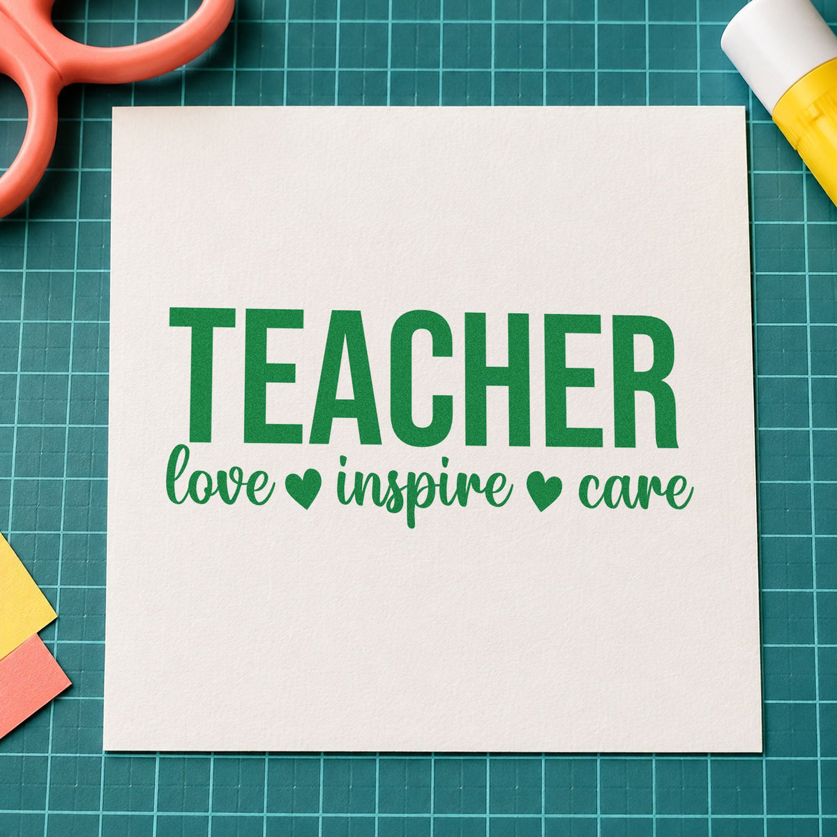 Teacher Love Inspire Care craft stamp imprint in green ink on a handmade project, one idea being framed clinic wall.