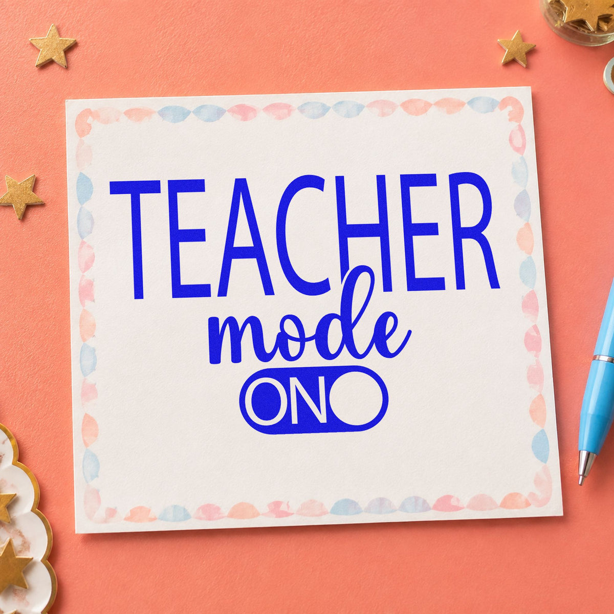 Teacher Mode On craft stamp imprinted in blue ink on paper, a design suited to outlet cover labels.