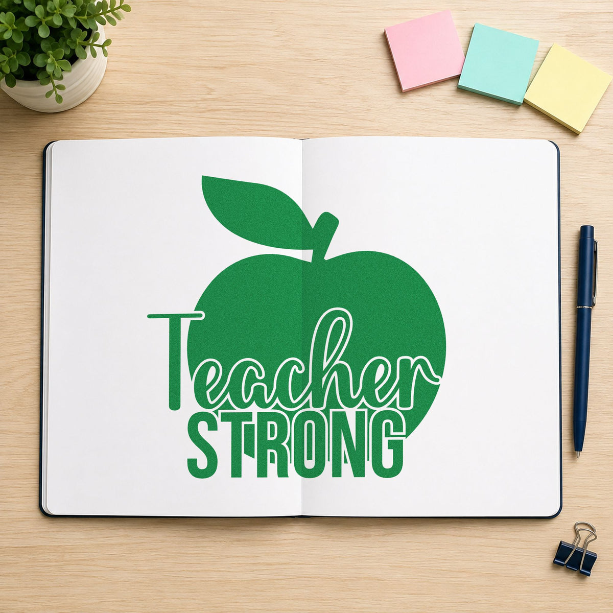 Teacher Strong Apple craft stamp imprint in green ink on a handmade project, one idea being framed chair office.