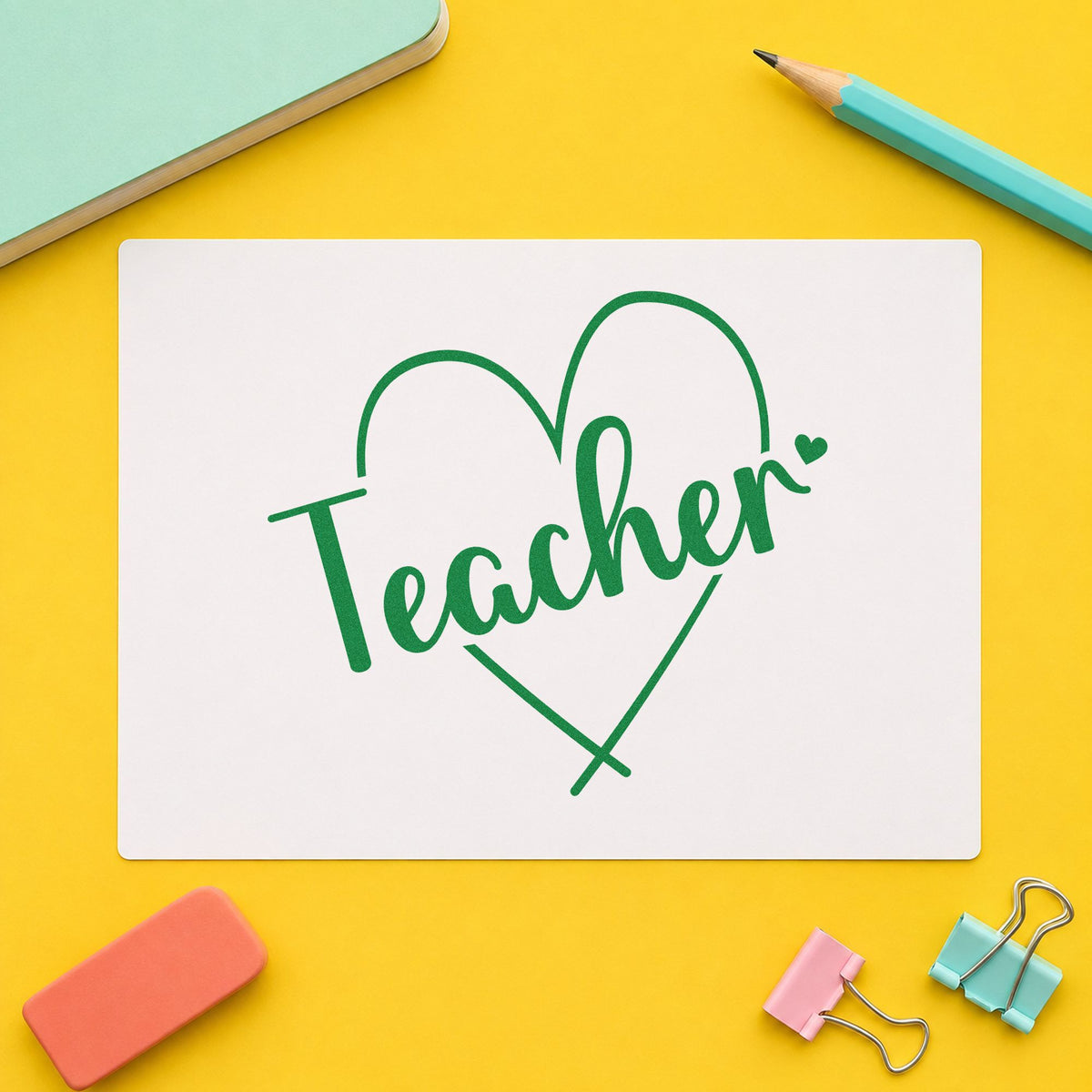 Teacher Heart Outline craft stamp imprint in green ink on a handmade project, one idea being love note pages.