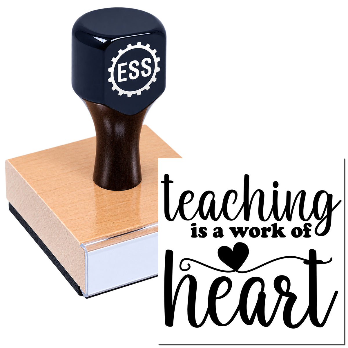 Black ESS rubber stamp with wooden base, featuring white "teaching is a work of heart" lettering on a white background.