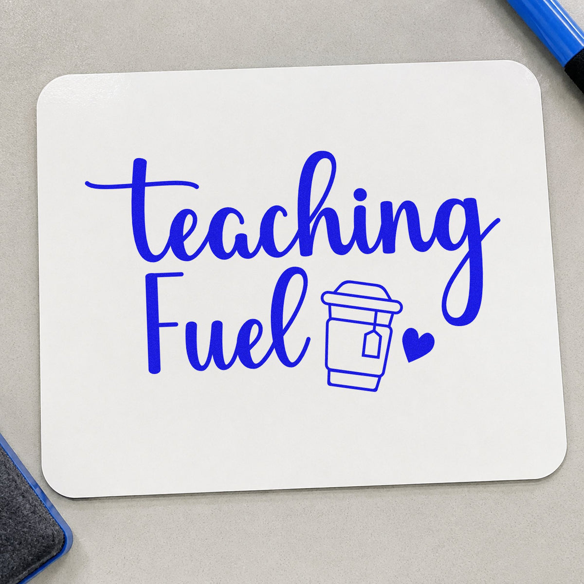 Teaching Fuel craft stamp imprinted in blue ink on paper, a design suited to pod drawer labels.