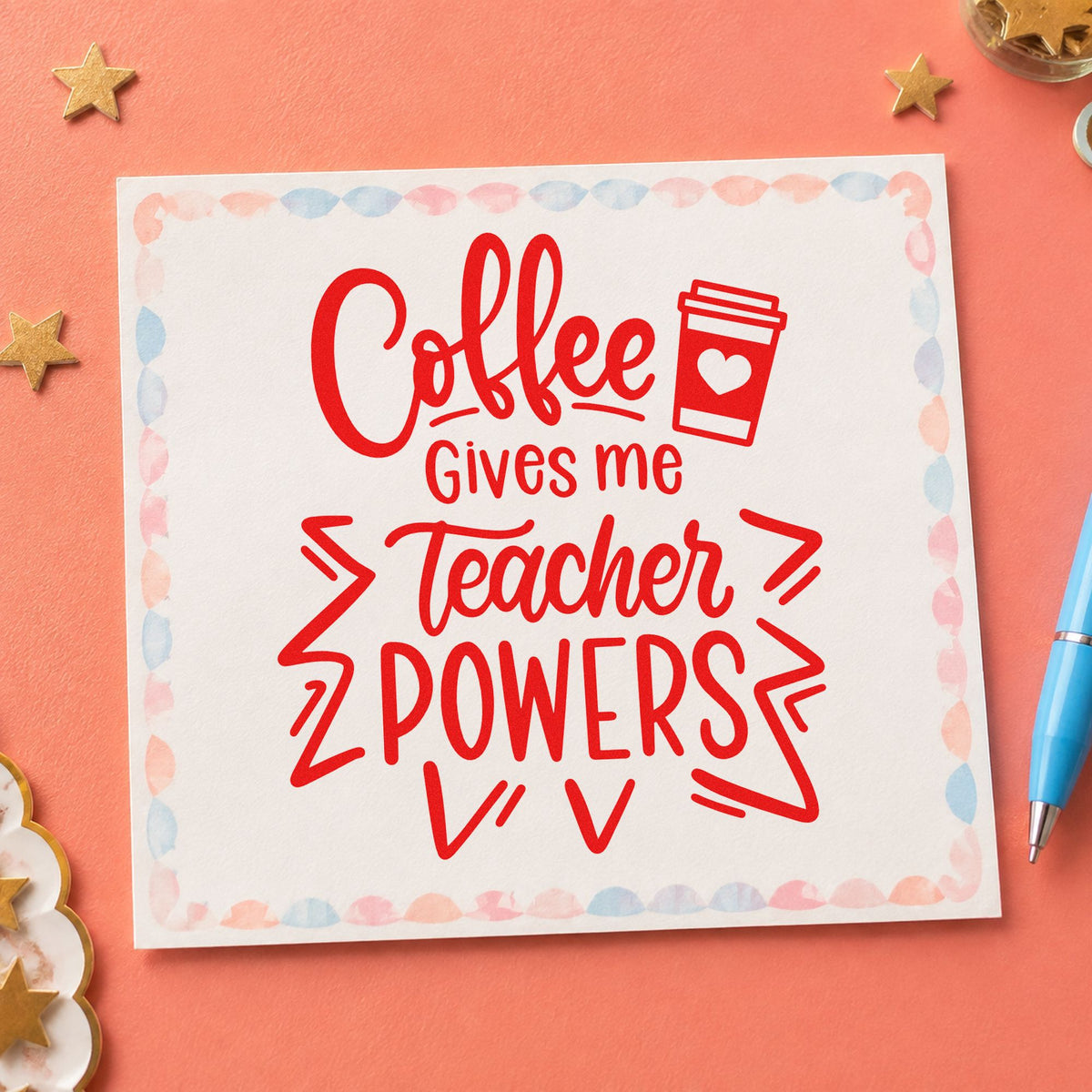 Coffee Gives Teacher Powers rubber stamp shown in red ink, stamped for projects such as testing week notes.