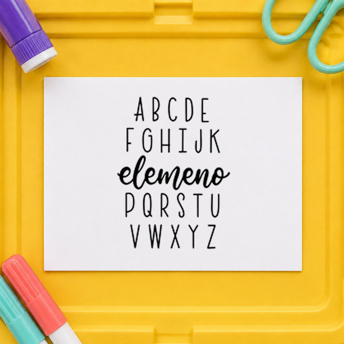 Alphabet Elemeno rubber stamp printed in black ink, ready for alphabet row cards and similar paper crafts.
