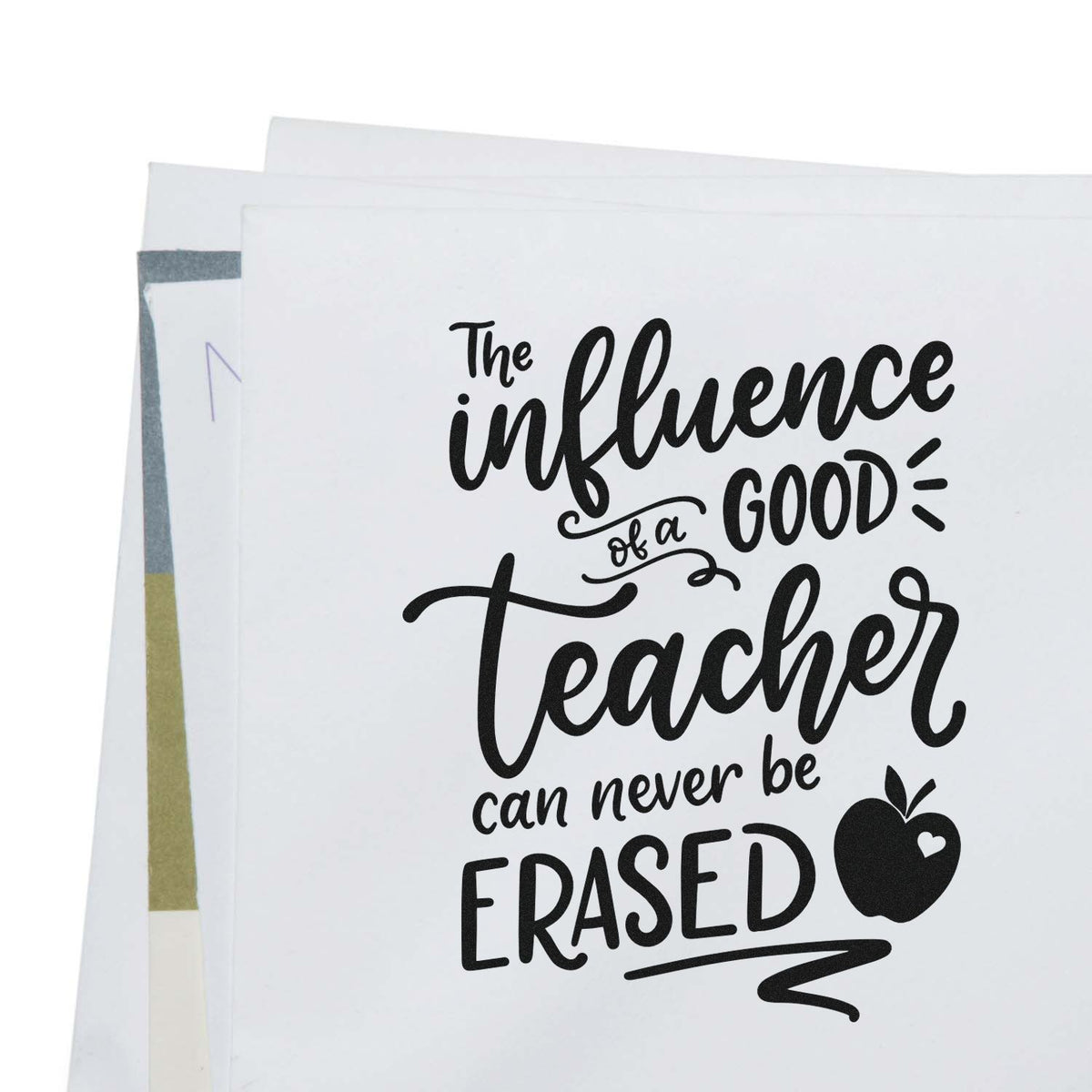 Black teacher quote stamp on white seal sheets with apple icon and pastel edges; says a good teacher can never be erased.