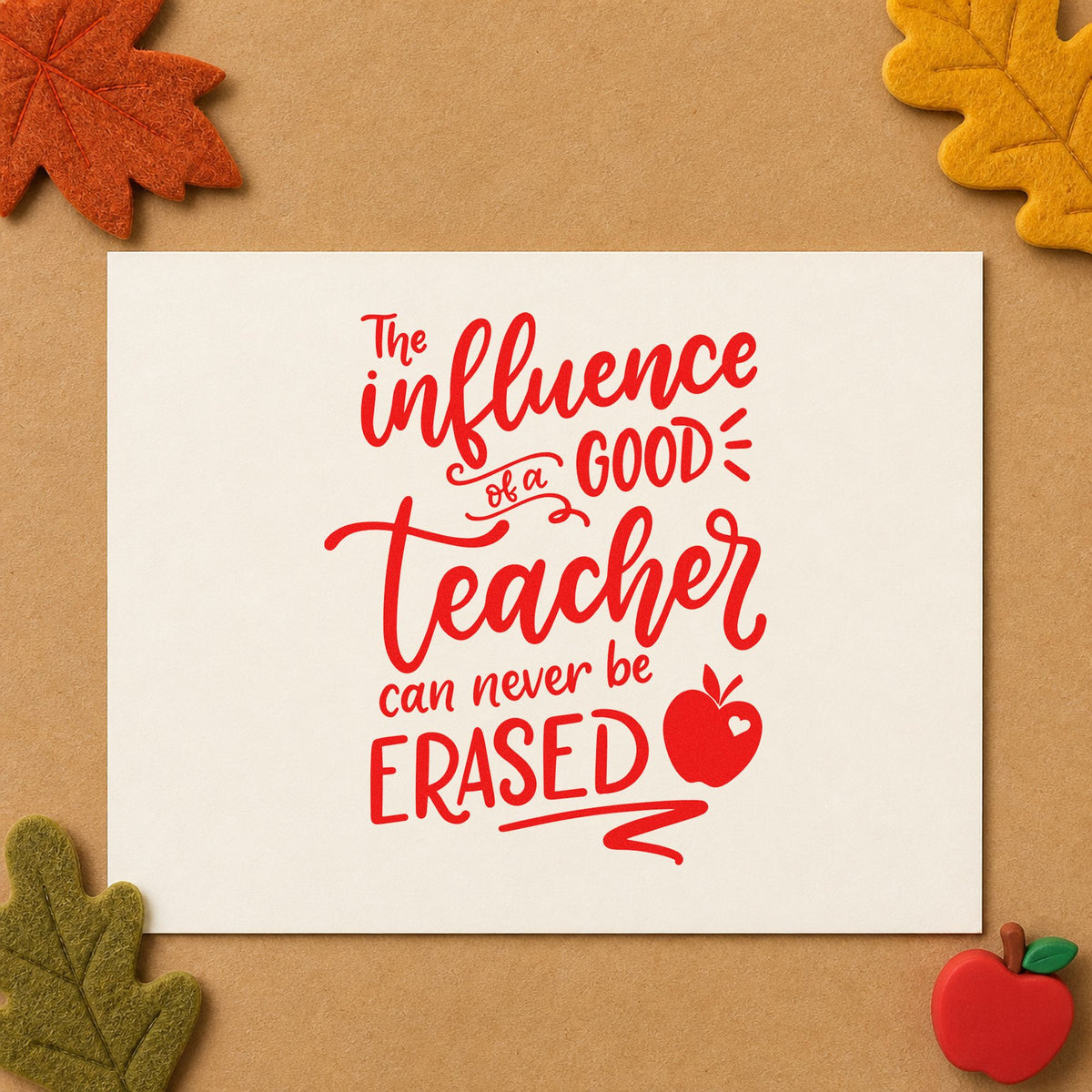 Good Teacher Never Erased rubber stamp shown in red ink, stamped for projects such as new district notes.